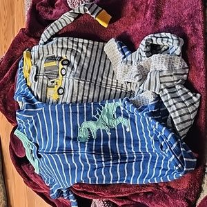 2 Carter's footy pajamas